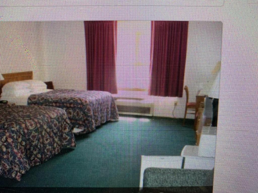 واتكينس غلين Villager Motel & Glen Manor Estate المظهر الخارجي الصورة